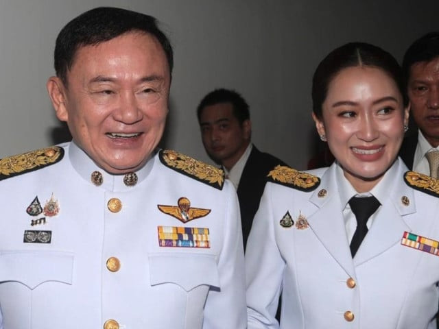 thailand s newly elected prime minister paetongtarn shinawatra and her father the country s former prime minister thaksin shinawatra arrive at the headquarters of thailand s pheu thai party in bangkok thailand aug 18 2024 thailand s former prime minister thaksin shinawatra has been included in a royal pardon to end his jail term earlier than scheduled his lawyer winyat chatmontree said on saturday photo inhua